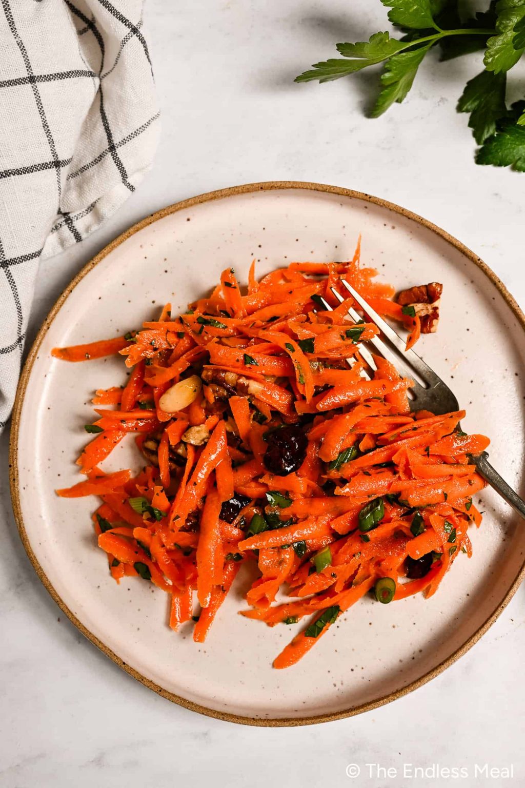 Raw Carrot Salad on a dinner plate